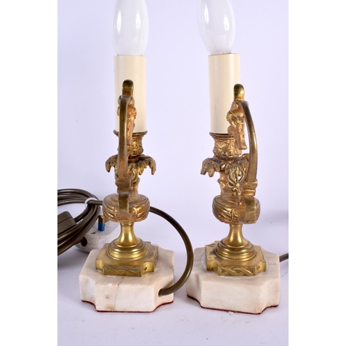 349 - A PAIR OF 19TH CENTURY EUROPEAN GRAND TOUR GILT BRONZE LAMPS After the Antiquity, formed as oil lamp... 