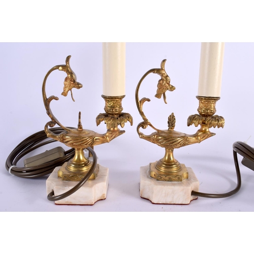 349 - A PAIR OF 19TH CENTURY EUROPEAN GRAND TOUR GILT BRONZE LAMPS After the Antiquity, formed as oil lamp... 