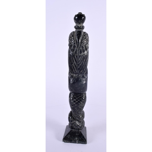 354 - AN UNUSUAL EARLY 20TH CENTURY TRIBAL CARVED STONE TOTEM POLE possibly Argallite. 23 cm high.