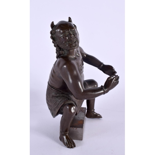 356 - A 19TH CENTURY JAPANESE MEIJI PERIOD BRONZE OKIMONO OF ONI modelled upon an iron seat. 16 cm x 8 cm.