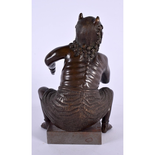 356 - A 19TH CENTURY JAPANESE MEIJI PERIOD BRONZE OKIMONO OF ONI modelled upon an iron seat. 16 cm x 8 cm.