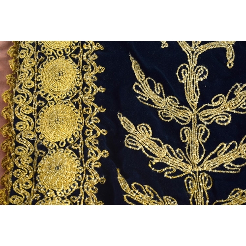 365 - A TURKISH MIDDLE EASTERN EMBROIDERED CHILDS JACKET decorated with silk gold embroidery. 70 cm x 42 c... 