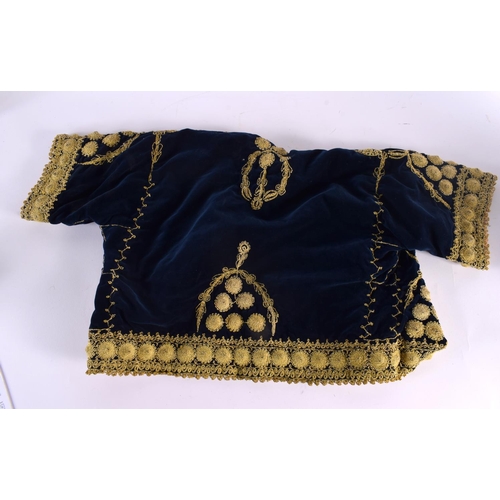 365 - A TURKISH MIDDLE EASTERN EMBROIDERED CHILDS JACKET decorated with silk gold embroidery. 70 cm x 42 c... 