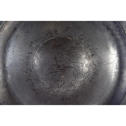 367 - A LARGE 17TH CENTURY PEWTER WRIGGLE WORK ARMORIAL CHARGER C1694 bearing 19th century presentation in... 