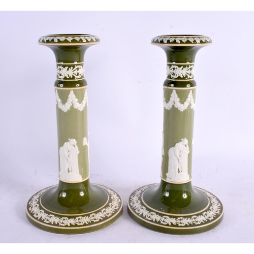 37 - A RARE PAIR OF CARLTONWARE IMITATION JASPERWARE CANDLESTICKS overlaid with classical figures. 22 cm ... 