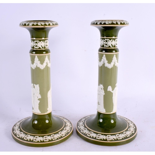 37 - A RARE PAIR OF CARLTONWARE IMITATION JASPERWARE CANDLESTICKS overlaid with classical figures. 22 cm ... 