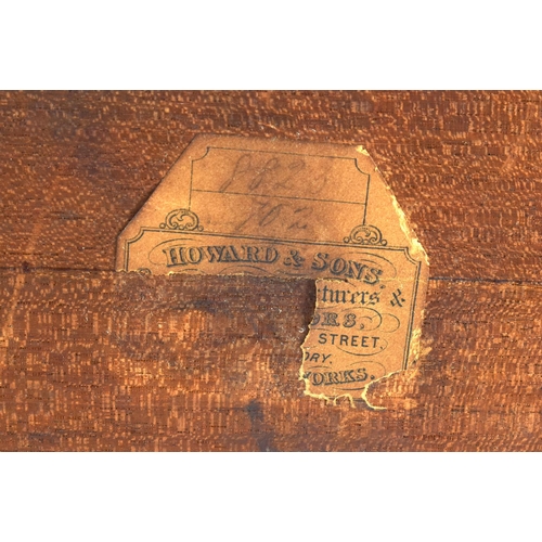 370 - AN UNUSUAL ANTIQUE HOWARD & SONS CANTERBURY bearing stamps to casters, original label to base and in... 