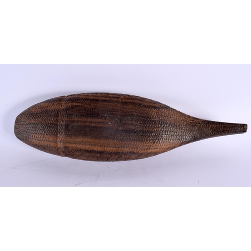 374 - A TRIBAL CARVED HARDWOOD FISH BOX AND COVER with bone eyes. 35 cm wide.