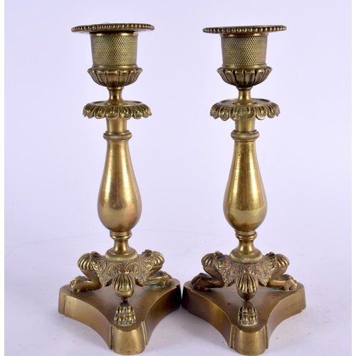 376 - A PAIR OF 19TH CENTURY FRENCH EMPIRE STYLE BRONZE CANDLESTICKS. 19 cm high.