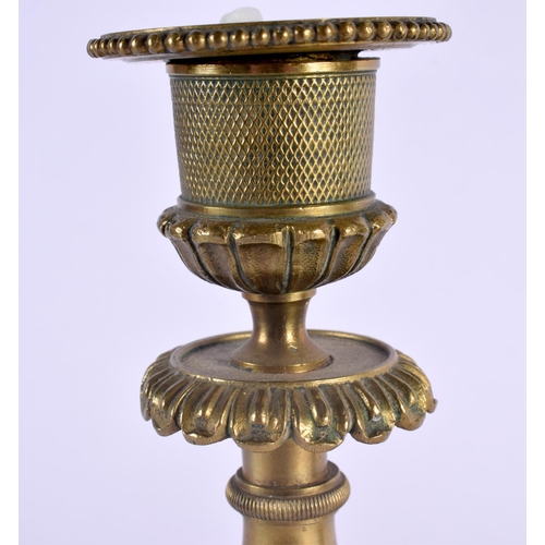 376 - A PAIR OF 19TH CENTURY FRENCH EMPIRE STYLE BRONZE CANDLESTICKS. 19 cm high.