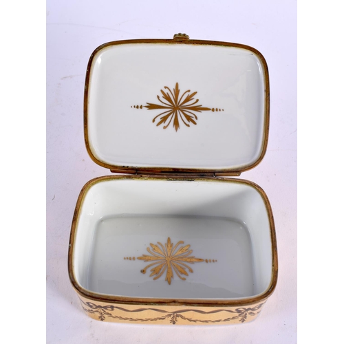 379 - A FRENCH GILT PAINTED PORCELAIN BOX. 10 cm x 7.5 cm.