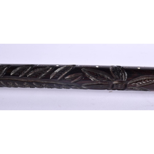 384 - AN EARLY 20TH CENTURY ANGLO INDIAN HARDWOOD PIQUE WORK INLAID WALKING CANE decorated with motifs. 10... 