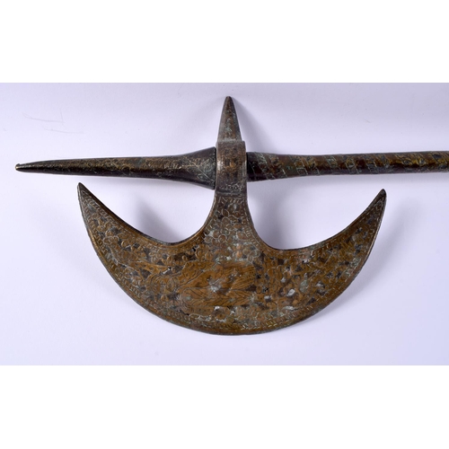 385 - A 19TH CENTURY MIDDLE EASTERN PERSIAN QAJAR BRONZE AXE decorated with figures in landscapes. 48 cm l... 