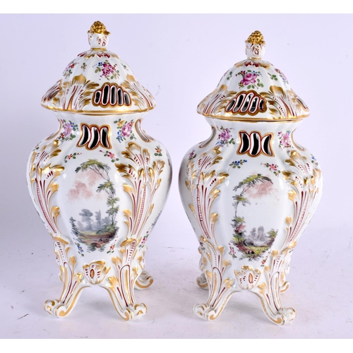 39 - A PAIR OF 19TH CENTURY GERMAN HOSCHT PORCELAIN POT POURRI VASES AND COVERS painted with figures in l... 