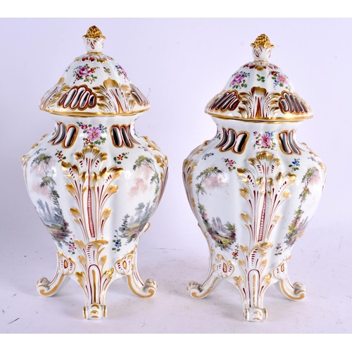 39 - A PAIR OF 19TH CENTURY GERMAN HOSCHT PORCELAIN POT POURRI VASES AND COVERS painted with figures in l... 