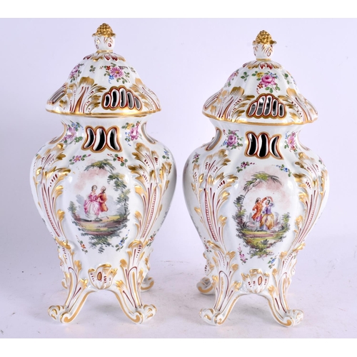 39 - A PAIR OF 19TH CENTURY GERMAN HOSCHT PORCELAIN POT POURRI VASES AND COVERS painted with figures in l... 