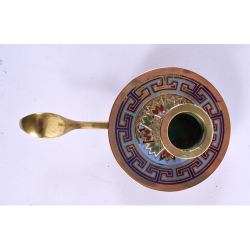 398 - A 19TH CENTURY FRENCH CHAMPLEVE ENAMEL BRONZE CHAMBERSTICK decorated with motifs. 13 cm wide.