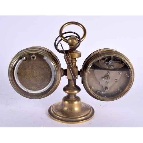 399 - AN UNUSUAL 19TH CENTURY ENGLISH INDUSTRIAL STYLE ROTATING DESK CLOCK with barometer and thermometer.... 