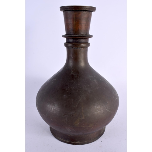 400 - AN 18TH/19TH CENTURY BRONZE HOOKAH PIPE BASE with inlaid inscription to the body. 28 cm x 15 cm.