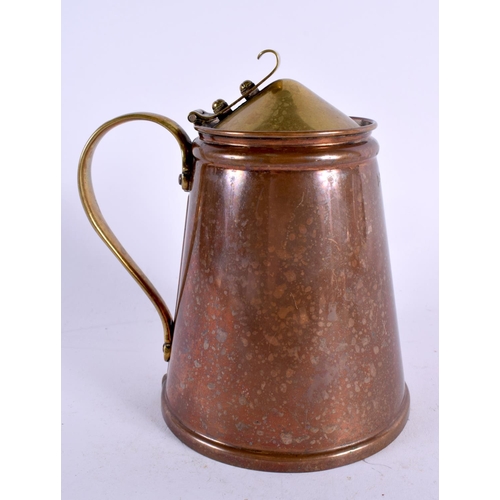 402 - AN ARTS AND CRAFTS W A S BENSON COPPER TANKARD. 17 cm high.