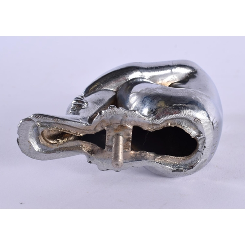 404 - AN ART DECO CHROME CAR MASCOT formed as a seated female clutching her legs. 14 cm x 9 cm.