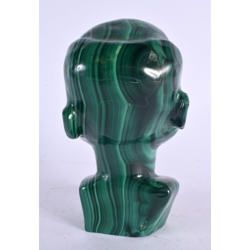 407 - AN EARLY 20TH CENTURY AFRICAN CARVED MALACHITE BUST. 16 cm x 7 cm.