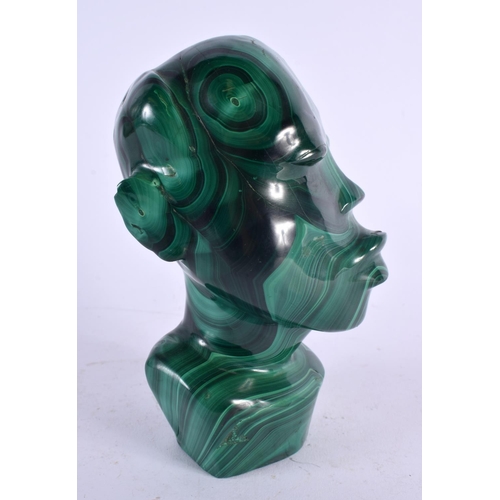 407 - AN EARLY 20TH CENTURY AFRICAN CARVED MALACHITE BUST. 16 cm x 7 cm.