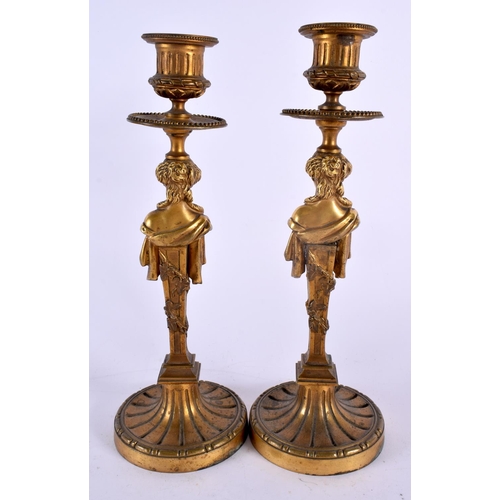 411 - A FINE PAIR OF MID 19TH CENTURY FRENCH BRONZE CANDLESTICKS formed with semi clad females. 27 cm high... 