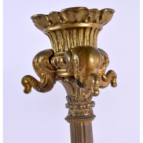 412 - A PAIR OF MID 19TH CENTURY FRENCH BRONZE CANDLESTICKS formed with lion and elephant mask heads. 35 c... 