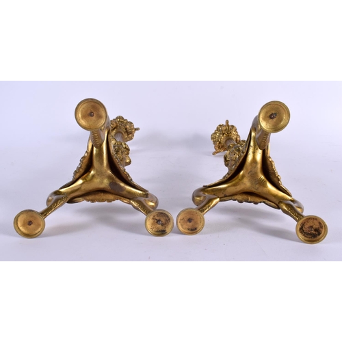 412 - A PAIR OF MID 19TH CENTURY FRENCH BRONZE CANDLESTICKS formed with lion and elephant mask heads. 35 c... 