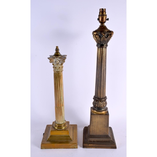 416 - TWO LARGE ANTIQUE COUNTRY HOUSE BRASS CANDLESTICK LAMPS formed as corinthian columns. Largest 50 cm ... 