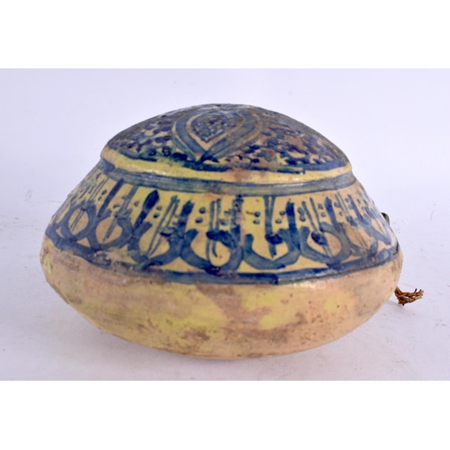 42 - A 19TH CENTURY MIDDLE EASTERN POTTERY FLASK painted with blue motifs. 18 cm x 12 cm.