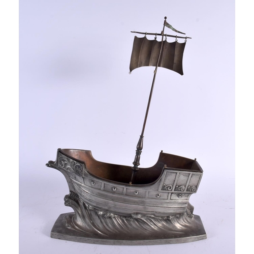 424 - AN ARTS AND CRAFTS PEWTER VIKING SHIP CENTREPIECE. 42 cm x 28 cm.