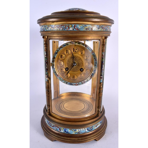 434 - A LARGE 19TH CENTURY FRENCH CHAMPLEVE ENAMEL AND BRONZE CLOCK GARNITURE decorated all over with foli... 