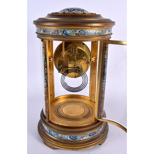 434 - A LARGE 19TH CENTURY FRENCH CHAMPLEVE ENAMEL AND BRONZE CLOCK GARNITURE decorated all over with foli... 