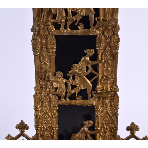 446 - AN ANTIQUE GOTHIC REVIVAL GILT METAL LETTER RACK decorated with classical figures. 30 cm x 14 cm.