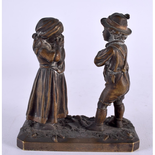 447 - AN ANTIQUE BRONZE FIGURAL GROUP modelled as a boy and girl. 9.5 cm x 8.5 cm.