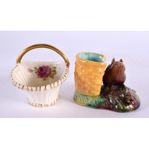 45 - A MINIATURE ROYAL WORCESTER PORCELAIN BASKET together with an unusual majolica mouse table salt. Lar... 