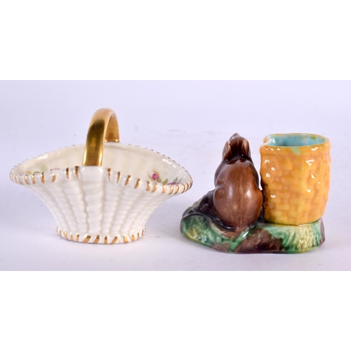 45 - A MINIATURE ROYAL WORCESTER PORCELAIN BASKET together with an unusual majolica mouse table salt. Lar... 