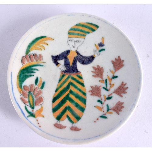 451 - A PAIR OF TURKISH KUTAHYA MIDDLE EASTERN PLATES painted with figures. 13 cm diameter.