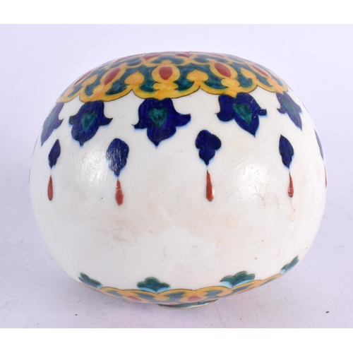 452 - A TURKISH KUTAHYA MIDDLE EASTERN HANGING MOSQUE BALL. 12 cm wide.