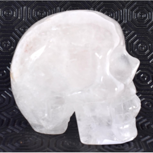 454 - A CONTEMPORARY ROCK CRYSTAL SKULL. 9 cm x 6 cm.