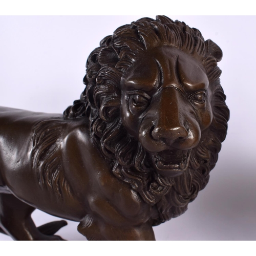 455 - A LARGE PAIR OF CONTEMPORARY BRONZE LIONS. 24 cm x 30 cm.