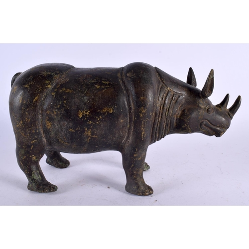 457 - A LARGE 19TH ENTURY AFRICAN BRONZE FIGURE OF A RHINOCEROS. 27 cm x 18 cm.