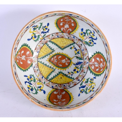 459 - A RARE MIDDLE EASTERN TURKISH KUTAHYA POTTERY BOWL painted with motifs. 18 cm diameter.