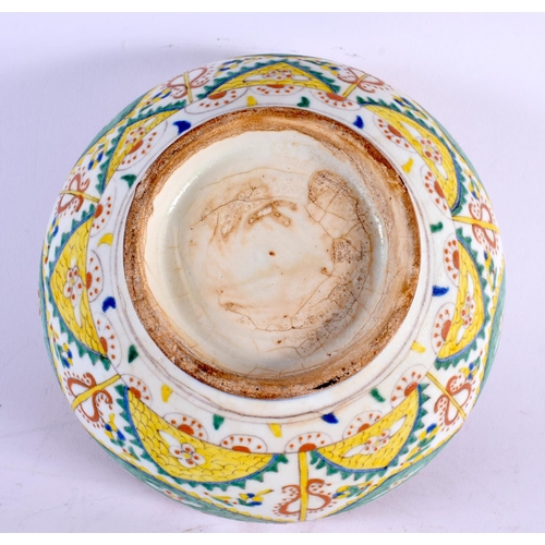 459 - A RARE MIDDLE EASTERN TURKISH KUTAHYA POTTERY BOWL painted with motifs. 18 cm diameter.