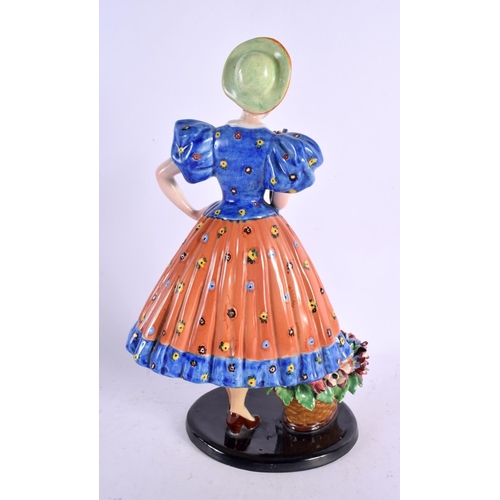 46 - A LARGE 1950S ITALIAN CERAMIC FIGURE OF A STANDING FEMALE in the manner of Lenci. 34 cm x 13 cm.