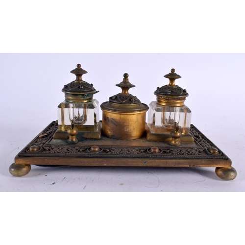 464 - AN ANTIQUE FRENCH BRONZE INKWELL decorated with motifs. 21 cm x 10 cm.