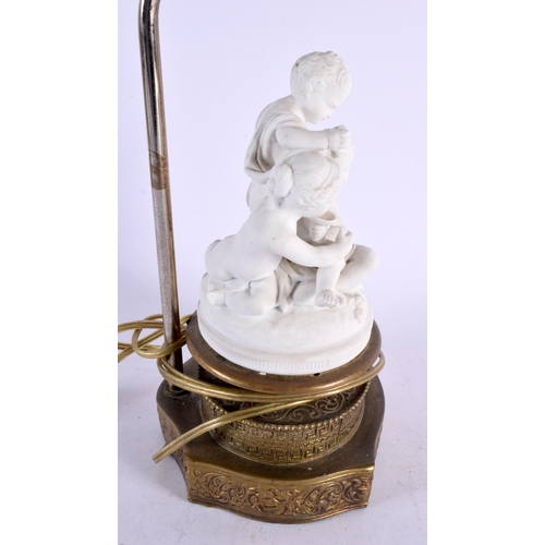 494 - AN ANTIQUE PARIAN WARE BISQUE PORCELAIN FIGURAL LAMP. 38 cm high.