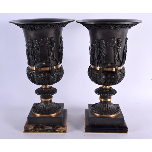 495 - A PAIR OF CONTEMPORARY BRONZE AND BLUEJOHN TWIN HANDLED CAMPAGNA URN VASES. 40 cm x 18 cm.